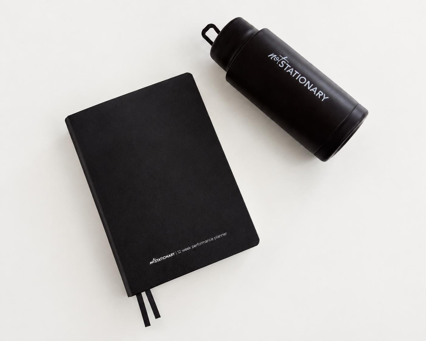 Not Stationary Clarity Duo - 12 Week Performance Planner in black with Signature Drink Bottle