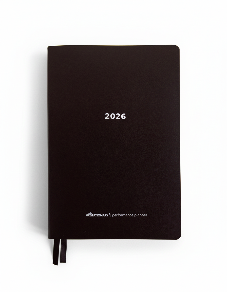 2026 Not Stationary Performance Planners in minimalist black with ribbon bookmarks, designed for intentional living and high performance.