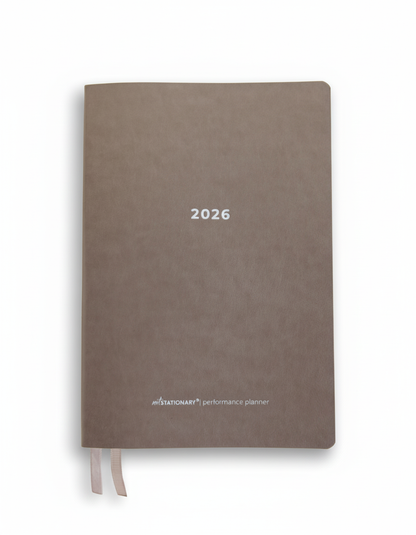 2026 Not Stationary Performance Planners in minimalist stone cover with ribbon bookmarks, designed for intentional living and high performance.